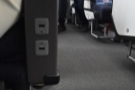 ... a separate pair of USB outlets per seat at the front of the seat arm.
