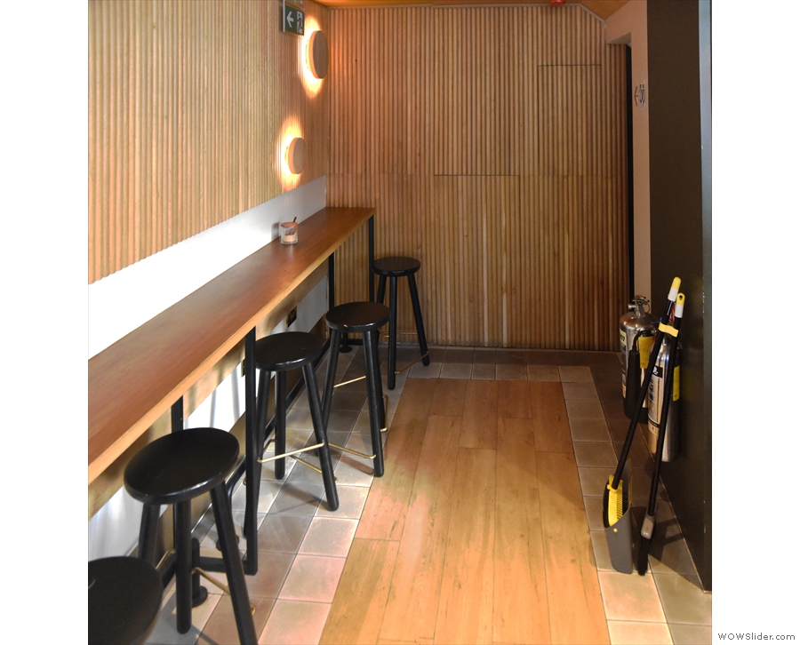 ... this six-person bar running along the left-hand wall.