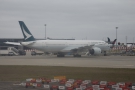 We were quickly on our way again, this time trundling past aircraft from Cathay Pacific...
