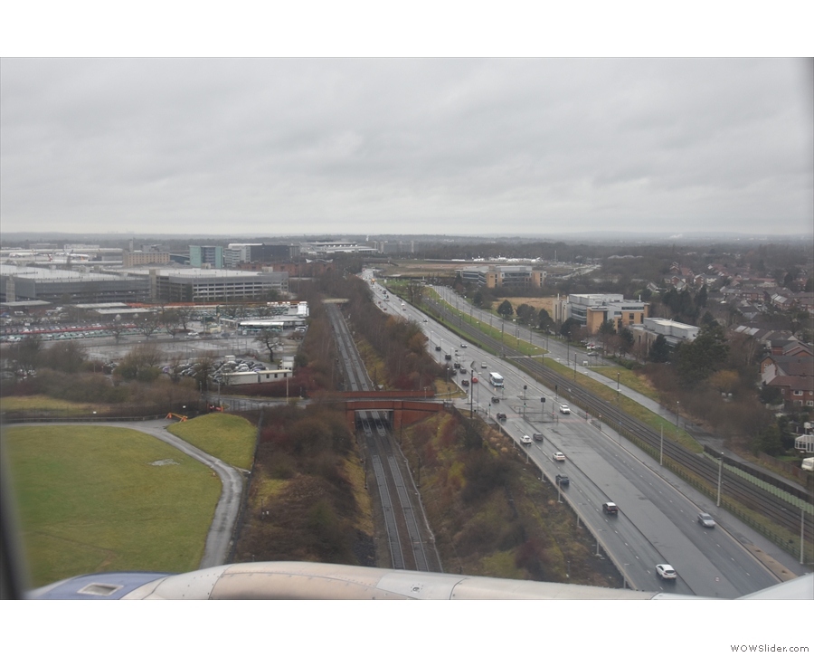 The final approach comes as we fly over the A555 and the railway line to the airport.