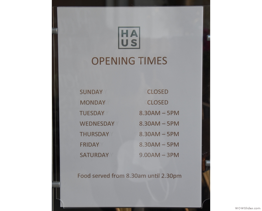 The opening times are posted to the right of the door (along with copies of the menus).
