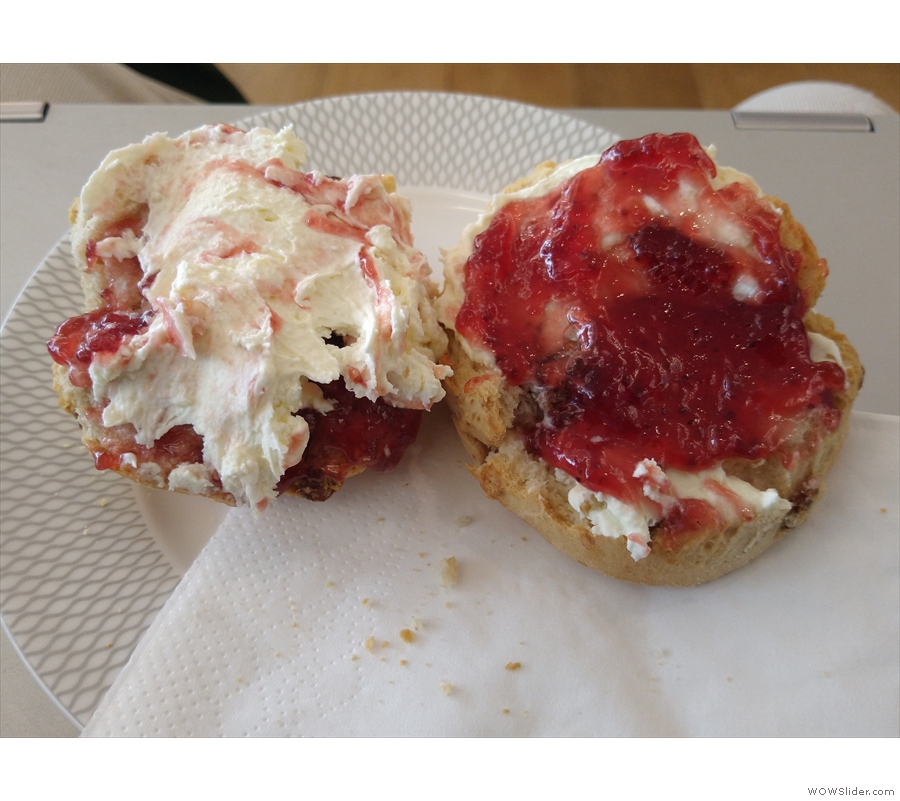 ... putting jam/cream on one half and cream/jam on the other. By the time I'd finished...