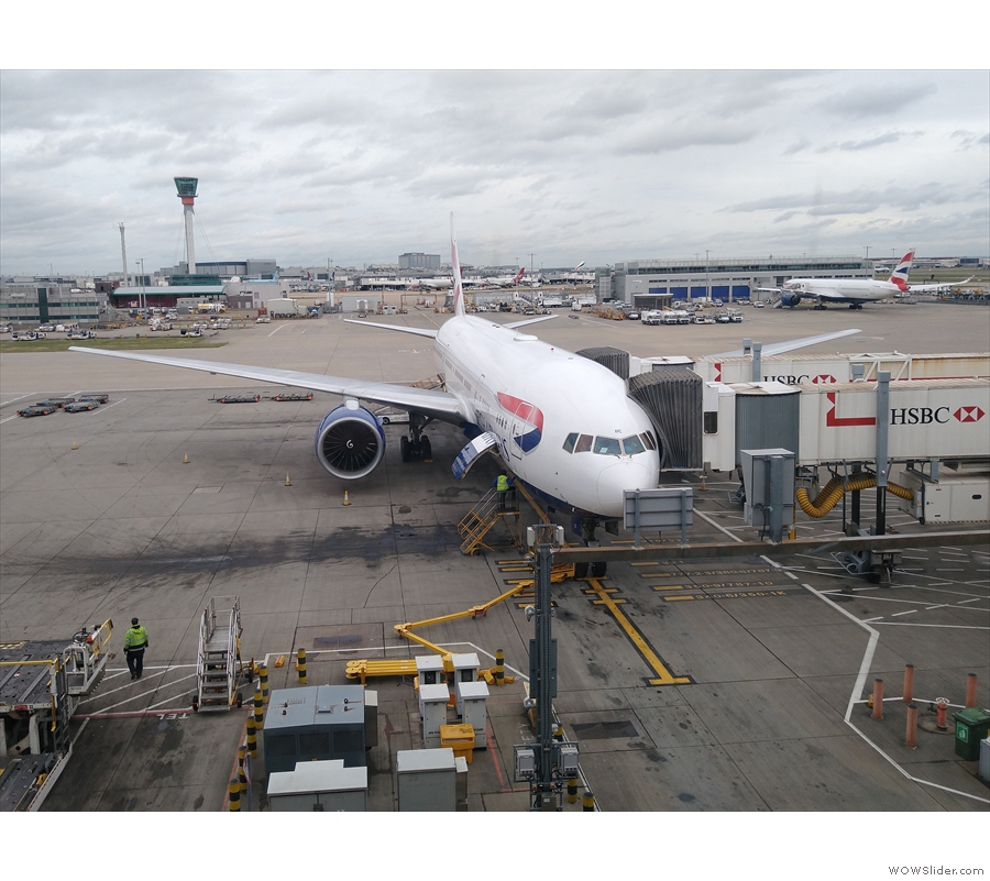 My plane, a Boeing 777-200, on the stand at Heathrow, waiting for us to board.