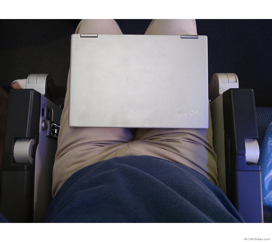 The seats are also very narrow. My laptop, for scale, is 30 cm/12 inches wide.