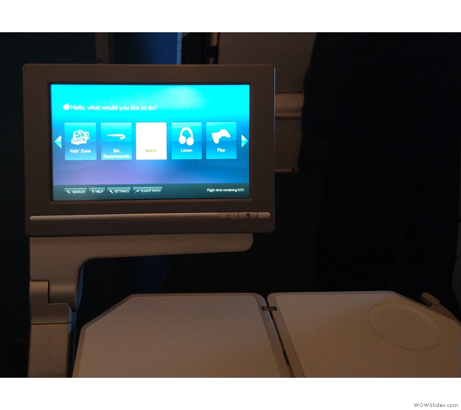 ... beneath the armrest, then pivots by 90° for the viewing. The monitor's pretty decent...