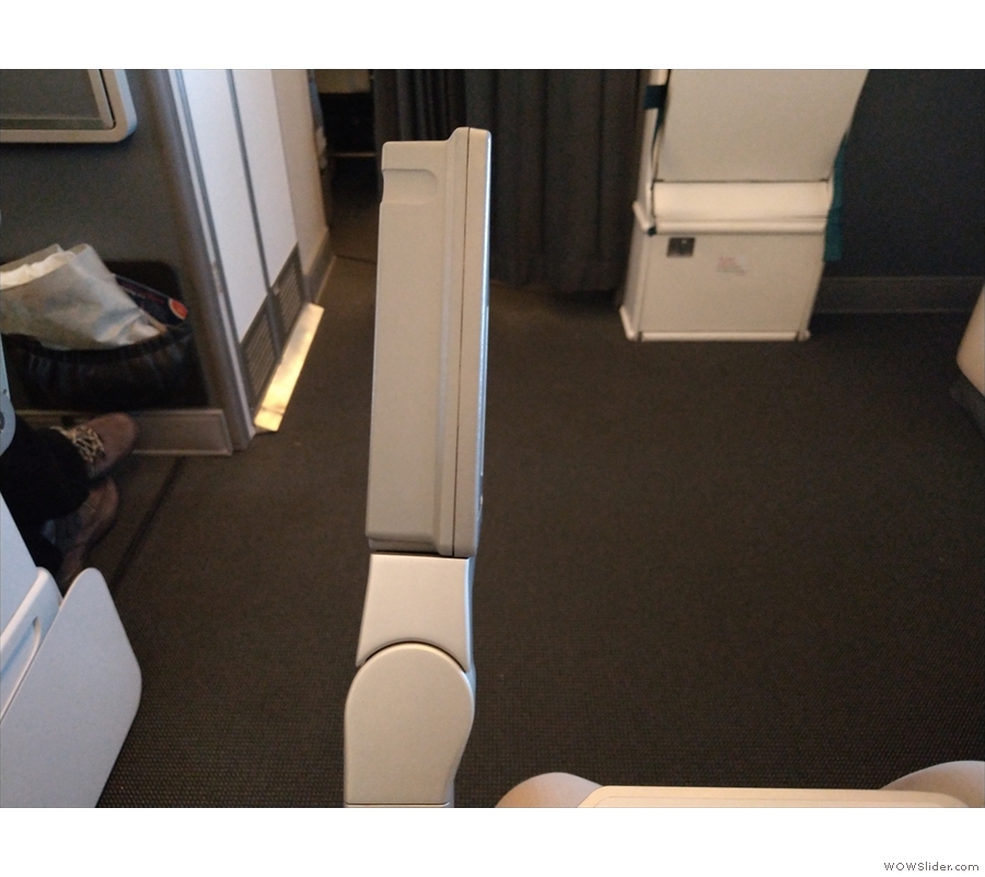 The monitor is in the seat-back for all other rows, but in the front row it lifts up from...
