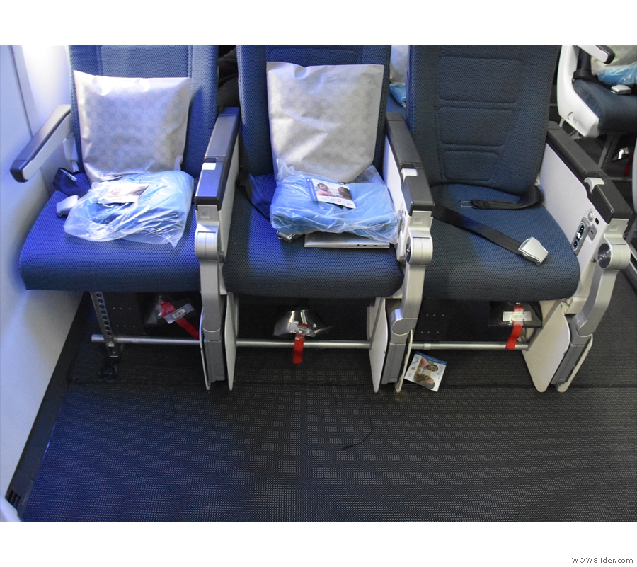 The seats in a little more detail. There is at-seat power, but in the exit row, it's carefully...