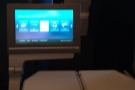 ... beneath the armrest, then pivots by 90° for the viewing. The monitor's pretty decent...