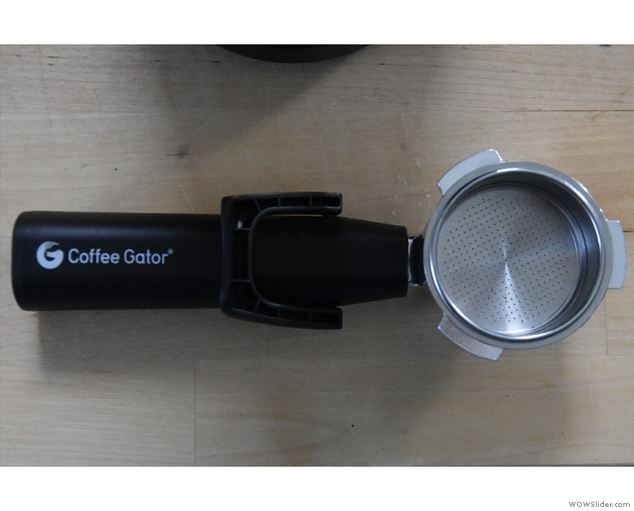 The portafilter is quite lightweight, made from plastic, with some metal in the head.