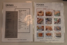 There are printed versions of the menu (with prices) on the counter as well...