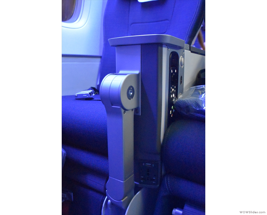 Each seat has its own power outlet, a combined AC and USB socket.