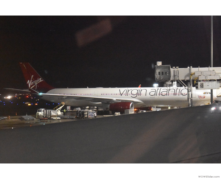 ... had replaced the JAL's 787 at Gate E11. We passed the Virgin Atlantic flight to London...