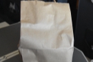 Breakfast was served at 02:55 (07:55 London time), in a stylish paper bag.