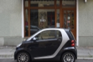 You know your shop is small when a two-seat Smart Car can completely block it!