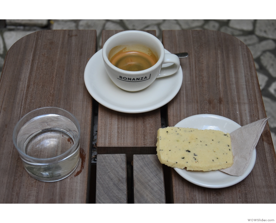 Meanwhile, I had an espresso (which came with a glass of water) plus a slice of shortbread.
