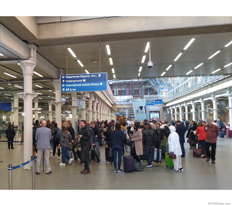 ... down to the Eurostar terminal, where the queue was out onto the concourse.