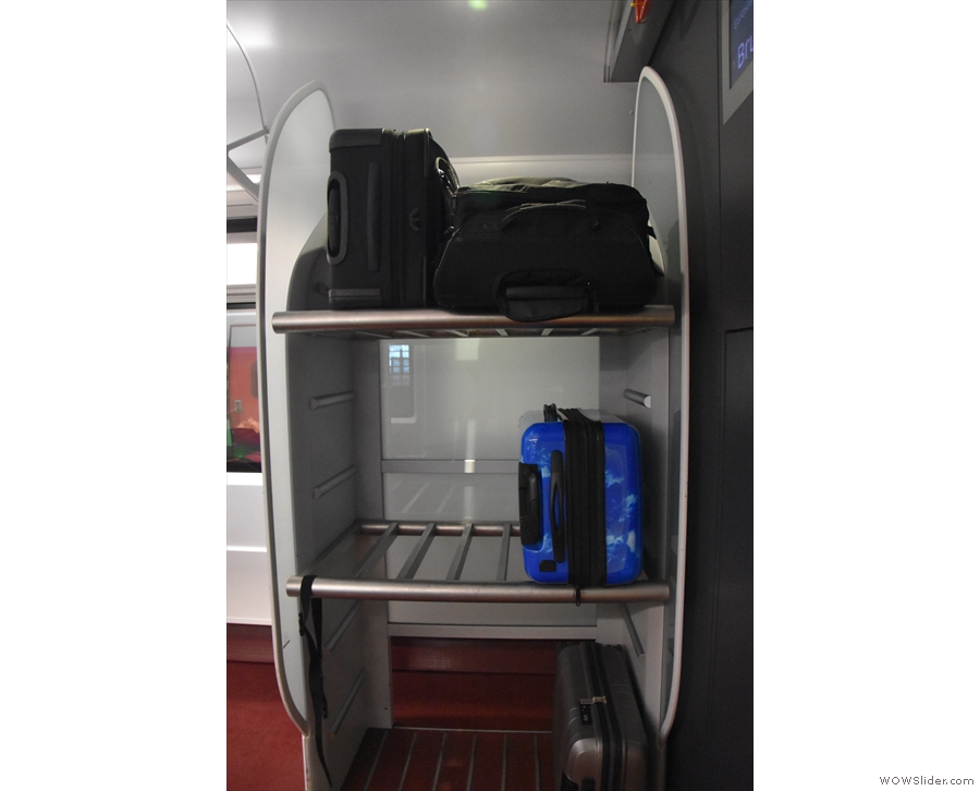 There's plenty of luggage space, by the way, with racks like these through the coach...