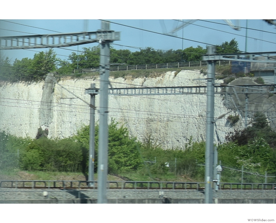... while the train zips under it by tunnel to emerge in the chalk pits of Dartford in Kent.