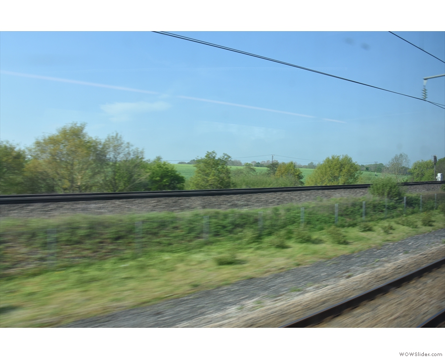 From there, the line runs alongside the domestic railway line (and the motorway)...