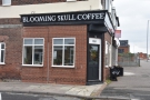 Back to Blooming Skull Coffee. It has a pleasing symmetry, with two windows on the...