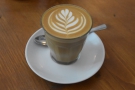 On my first visit, I started with a flat white, served in a glass...