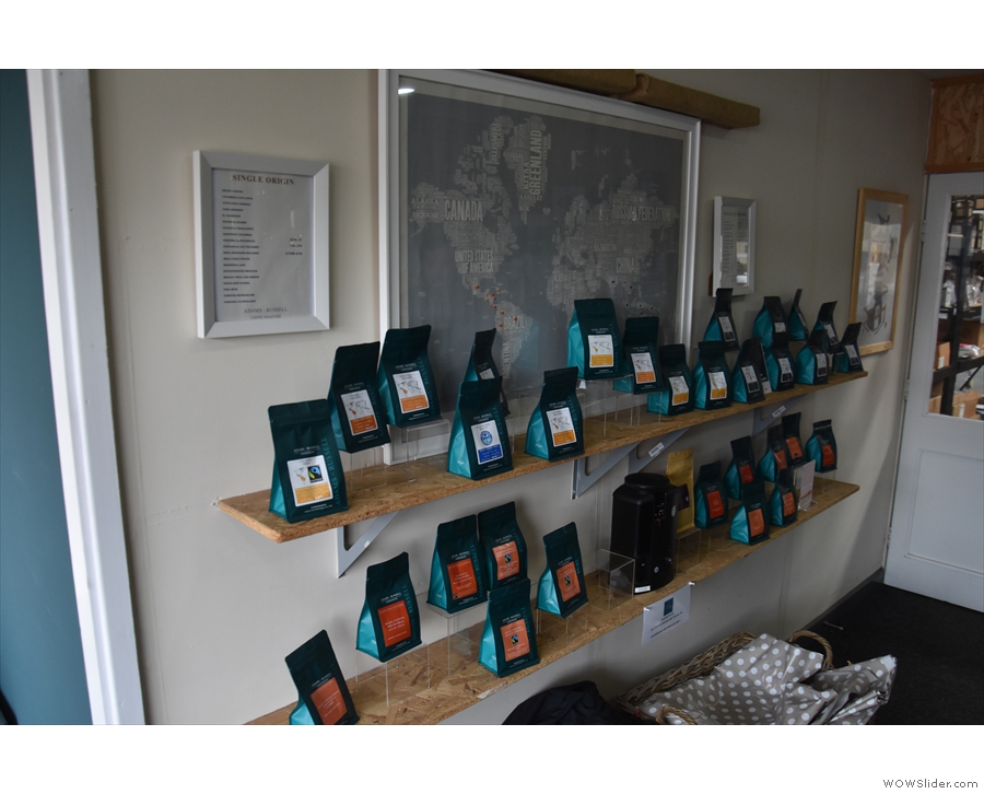Meanwhile, the two shelves on the left-hand wall are given over entirely to coffee beans.