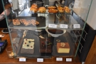 The cakes, meanwhile, are displayed in this glass case on the right...