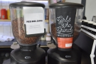... machine and its twin grinders, one for the house blend and one for the guest.