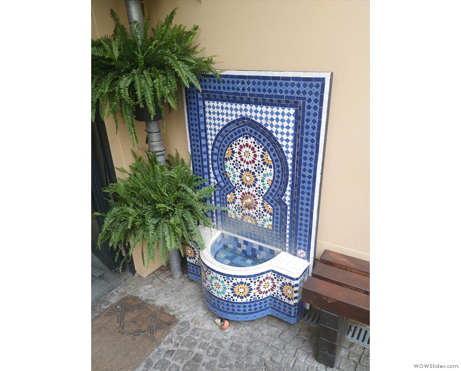 ... Ben Rahim's Tunisian roots, as does this awesome tiled fountain by the door.
