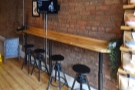 ... there's another four-person bar, this time with tall stools.