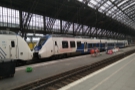 Köln has a wide variety of trains, such as this regional service by National Express...
