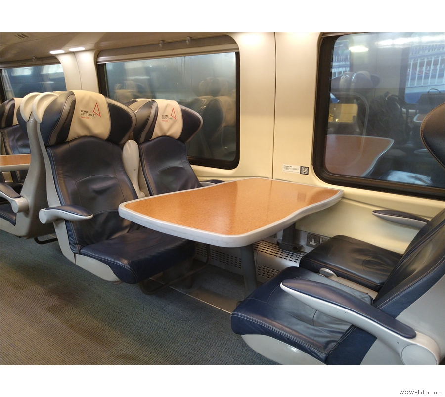... on one side, some of the airline style and some, like this, a four-person table, while...