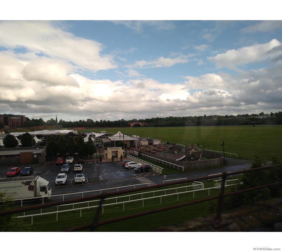 Just after Chester station, the line goes past Chester racecourse before crossing the...