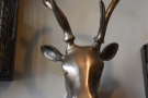 There's also a model of a stag's head mounted on the wall...