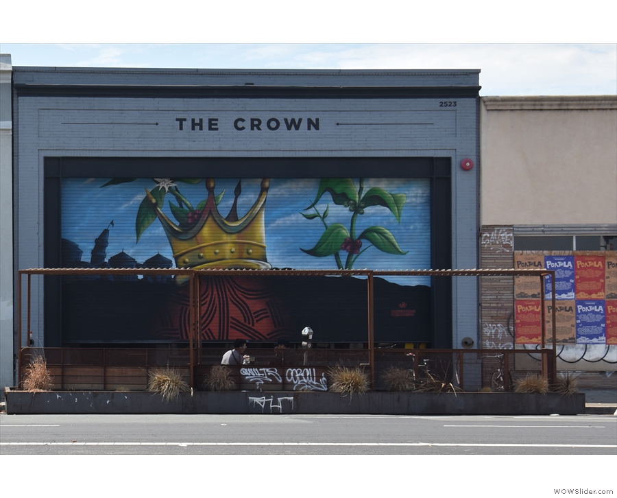 ... since the mural on the roll-up shutters catches the eye.