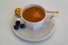 My espresso in more detail, served with three blueberries as palate cleansers.