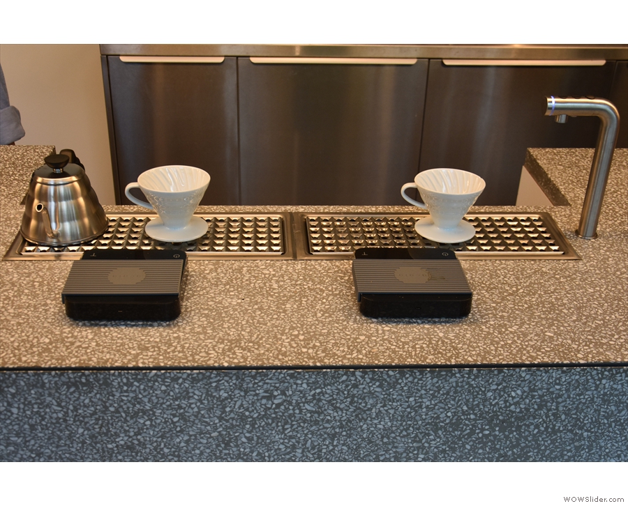 Carrying on down the counter, there's the pour-over station with its V60s and scales...
