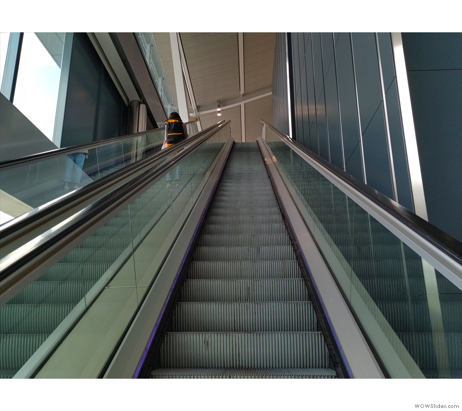 A second escalator takes you all the way to the top of the terminal and departures.