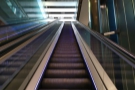 I like to take the escalators if I can. The first one goes all the way to ground level...
