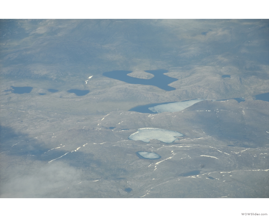 A close up of the various lakes in the last photo, some frozen, some not.
