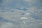 A close up of the various lakes in the last photo, some frozen, some not.