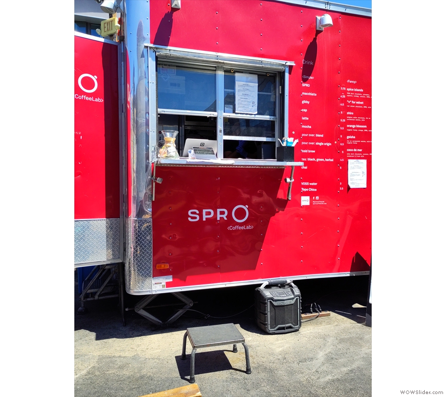 Once you've decided, you order at the window at the left-hand end of the trailer. This...