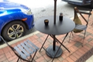 There's plenty of outside seating, including four of these two-person tables on the...