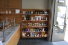 ... is a large set of retail shelves, stuffed with bags of coffee from all the roasters at CoRo.
