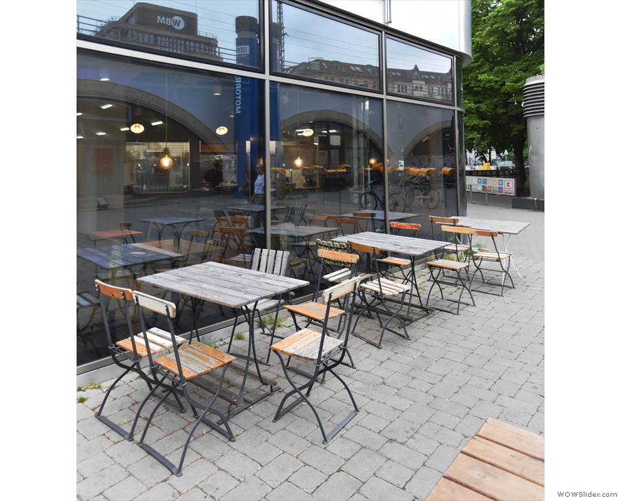 These four-person tables are arranged in two rows, one by the windows and the other...