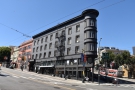This building stands on the corner of Columbus Avenue and Kearny Street in North Beach.