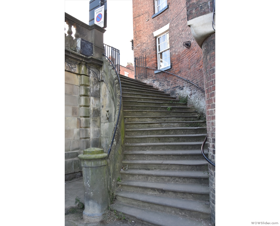 ... up these steps from the river walk. That's Nomad at the top, on the right.
