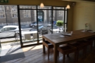 The view from the counter, with the communal table between counter and window.