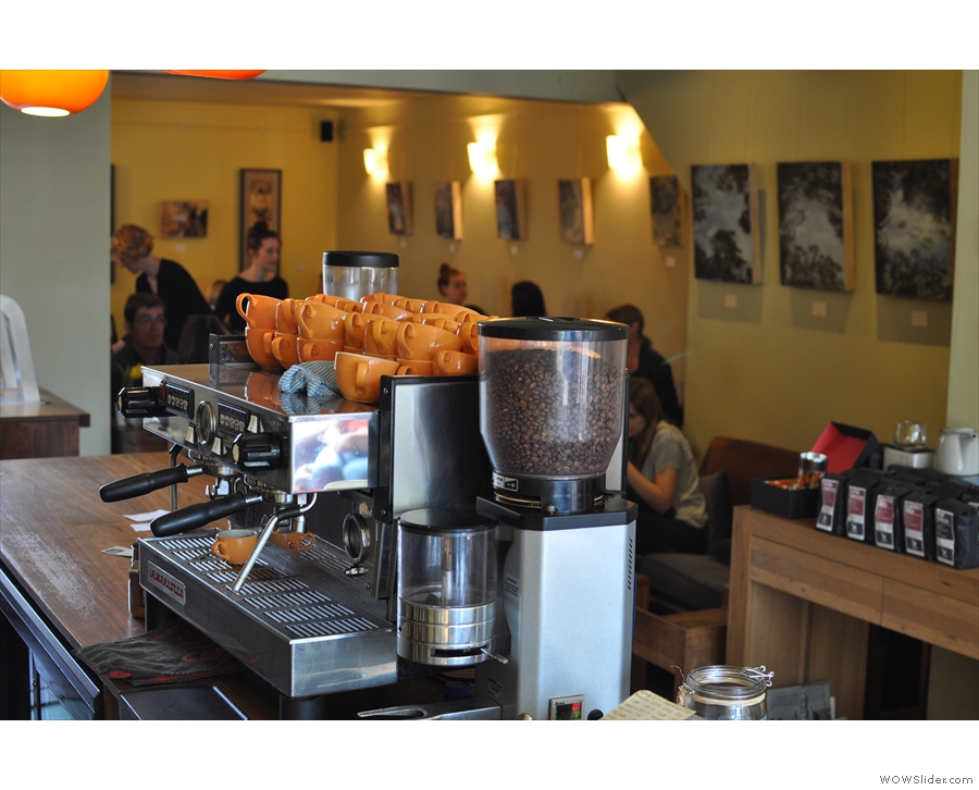 A view across the counter of the seating area at the back. That's my friend Kate hiding behind the coffee grinder...