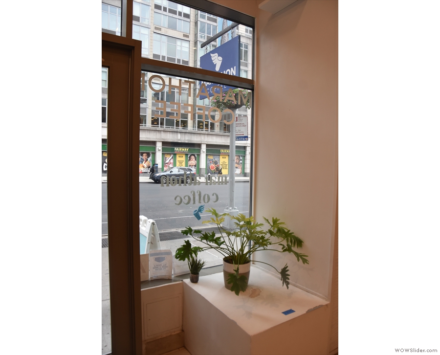 ... with the plant in the window to the left of the door offering some welcome greenery.